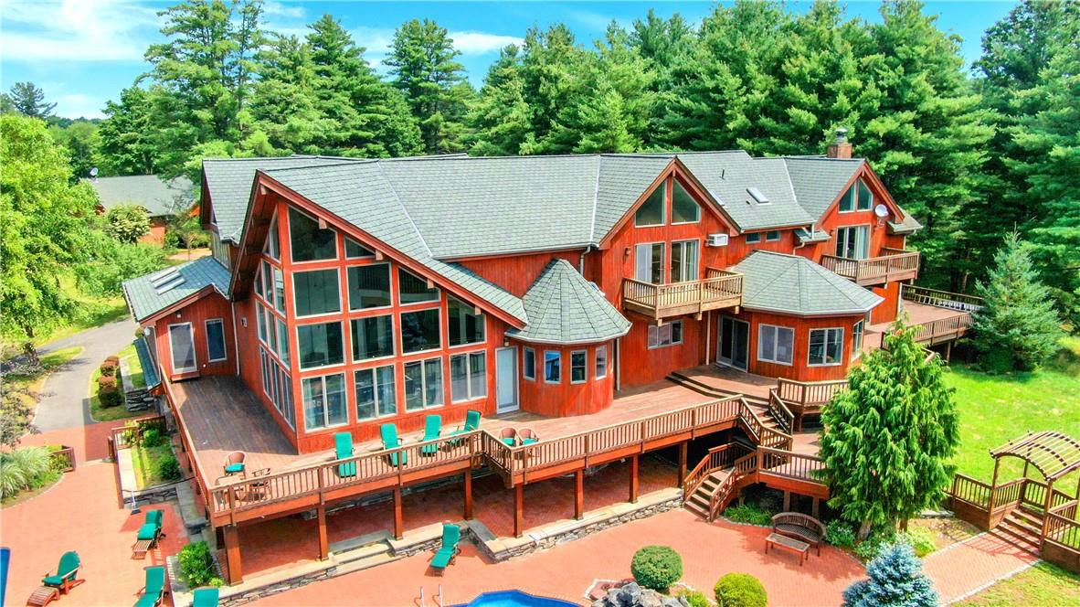 941 Starlight Road Monticello, NY 12701 - Photo 2 of 30 an aerial view of a house with swimming pool