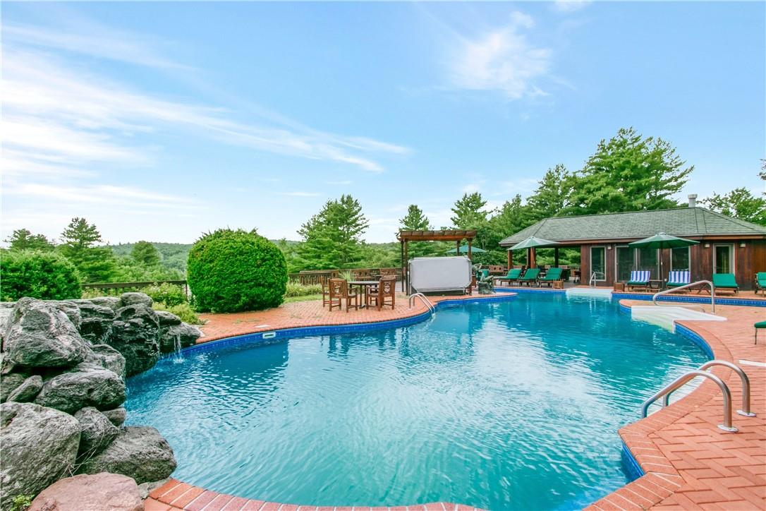 941 Starlight Road Monticello, NY 12701 - Photo 4 of 30 a view of a swimming pool with a patio