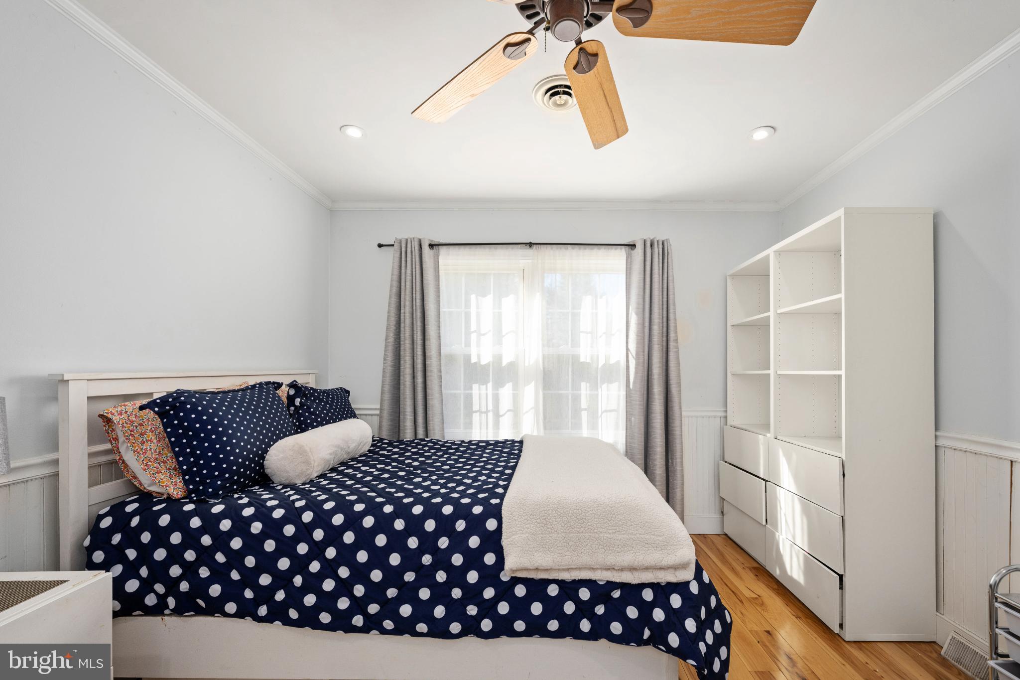 224 Prince Street Northeast Leesburg, VA 20176 - Photo 27 of 84 a bedroom with a bed and window