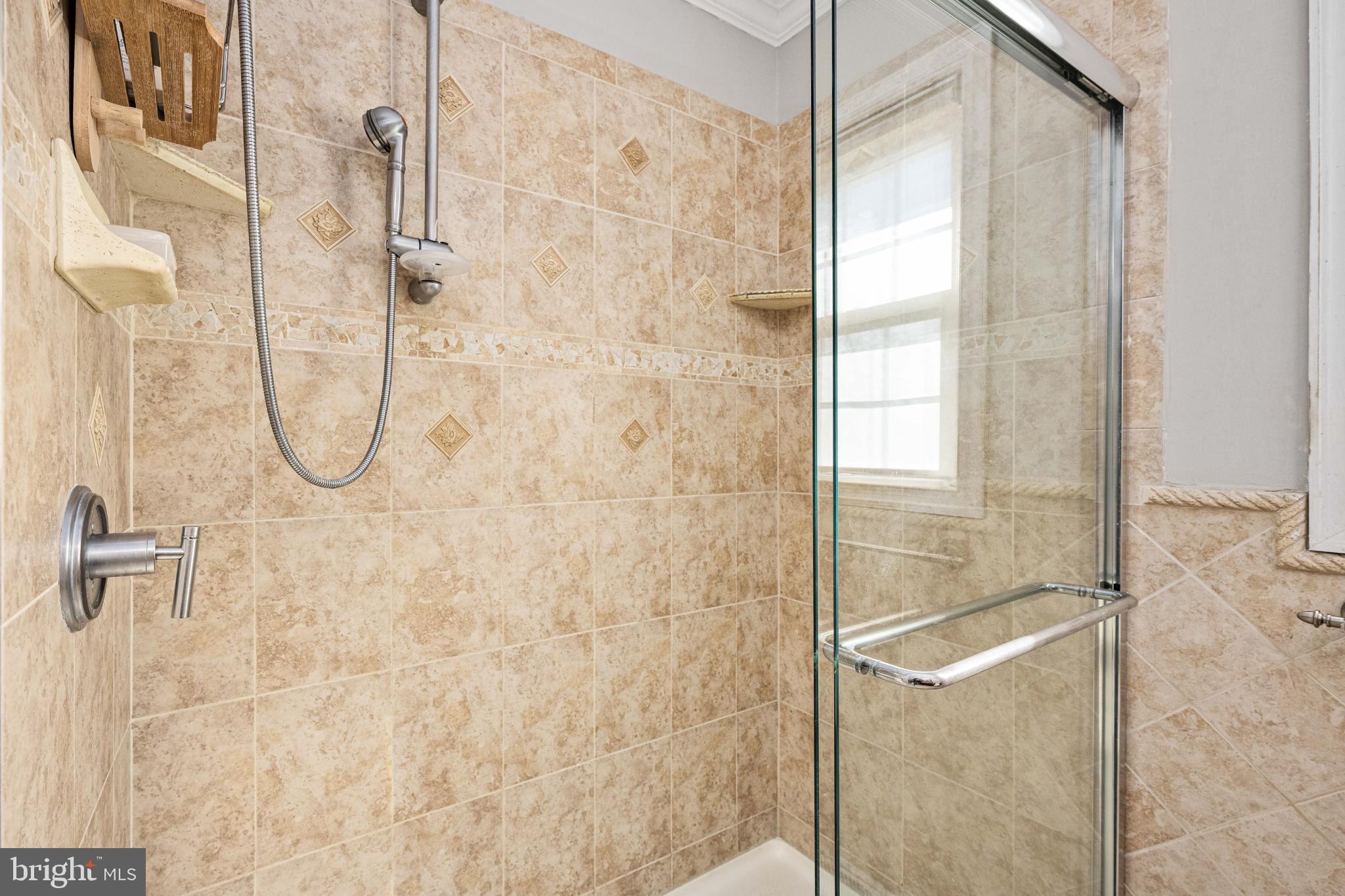 224 Prince Street Northeast Leesburg, VA 20176 - Photo 31 of 84 a bathroom with a glass shower door