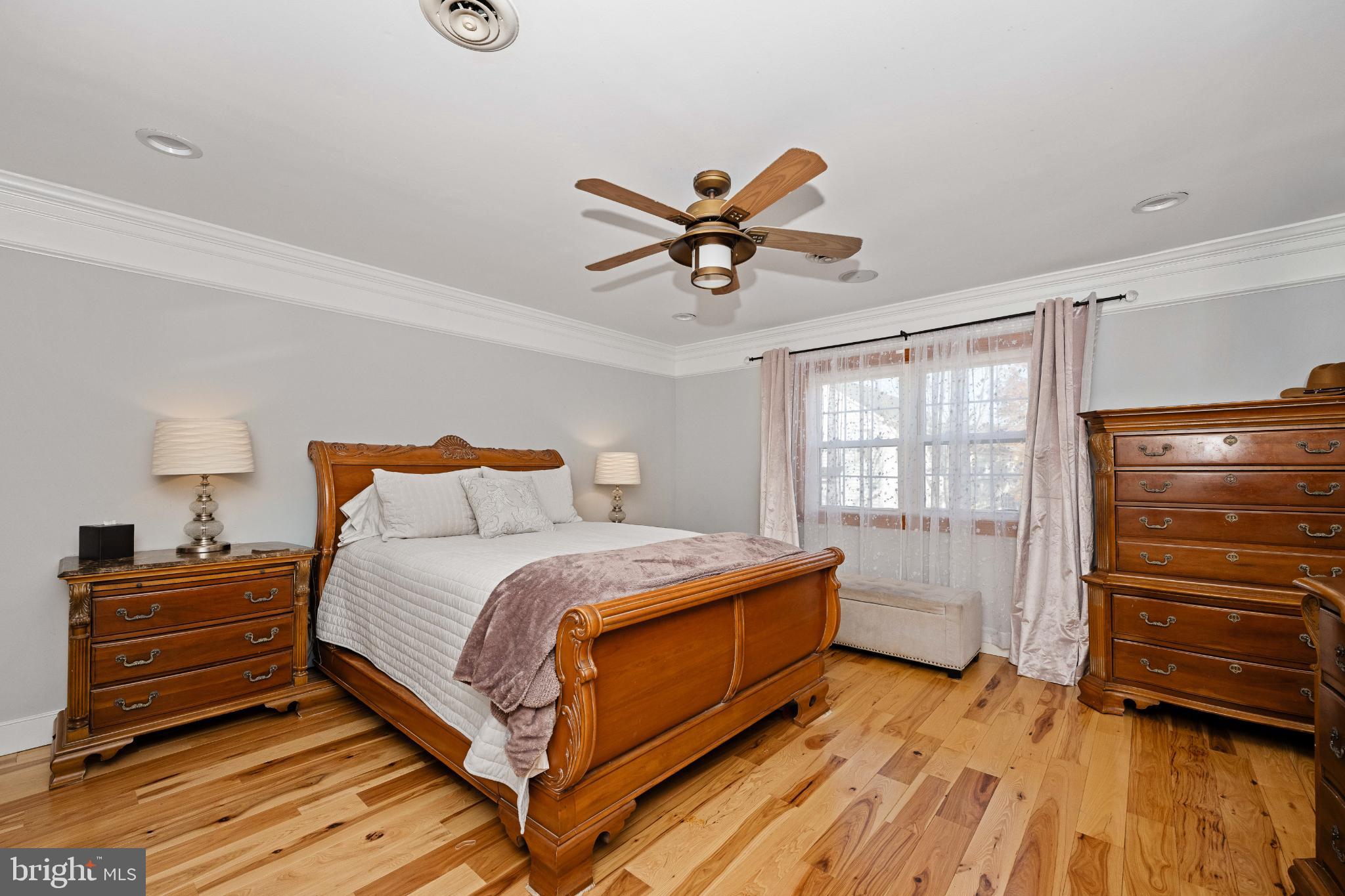 224 Prince Street Northeast Leesburg, VA 20176 - Photo 34 of 84 a bedroom with a bed and a dresser