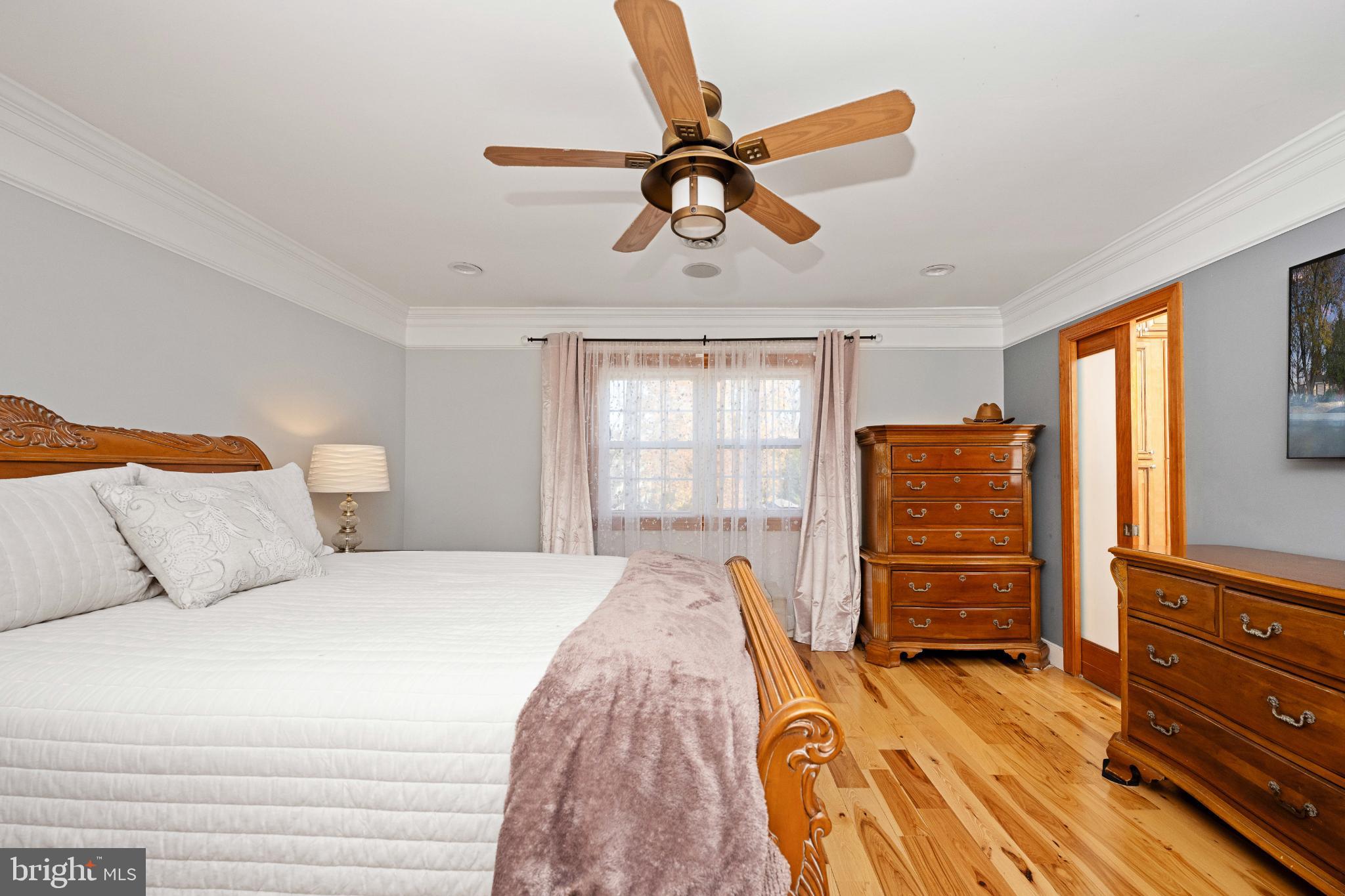 224 Prince Street Northeast Leesburg, VA 20176 - Photo 35 of 84 a bedroom with a bed and a dresser