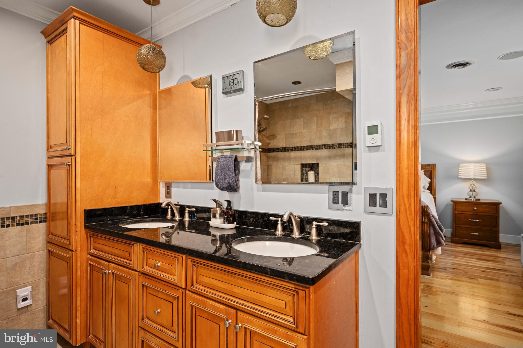 224 Prince Street Northeast Leesburg, VA 20176 - Photo 41 of 84 a bathroom with a sink double vanity and a mirror