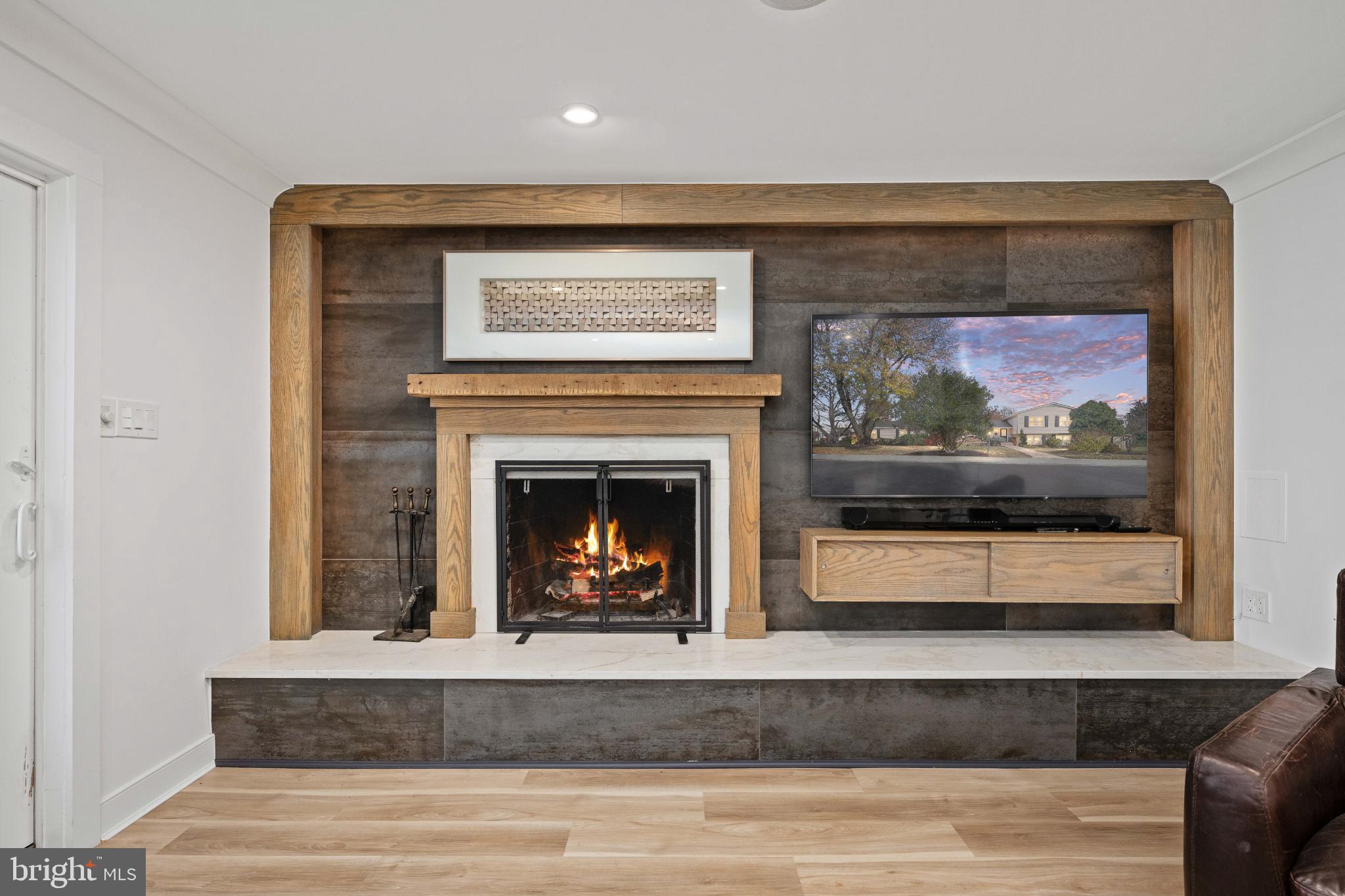 224 Prince Street Northeast Leesburg, VA 20176 - Photo 46 of 84 a view of a living room with a fireplace and a glass door