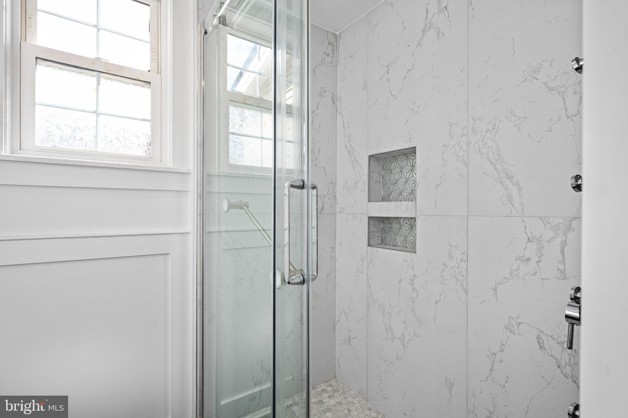 224 Prince Street Northeast Leesburg, VA 20176 - Photo 53 of 84 a bathroom with a shower