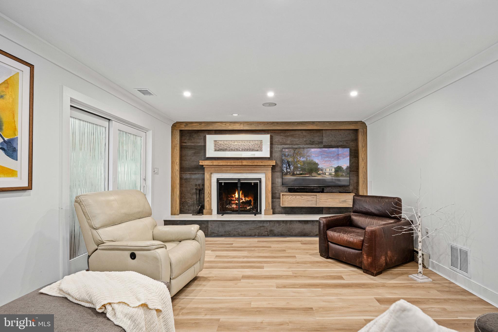 224 Prince Street Northeast Leesburg, VA 20176 - Photo 58 of 79 Modern living space with cozy fireplace.