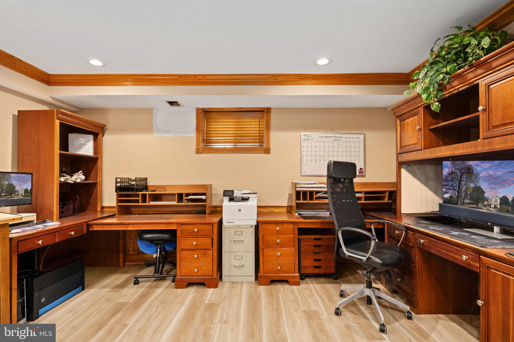224 Prince Street Northeast Leesburg, VA 20176 - Photo 64 of 84 a view of a workspace with furniture and a kitchen