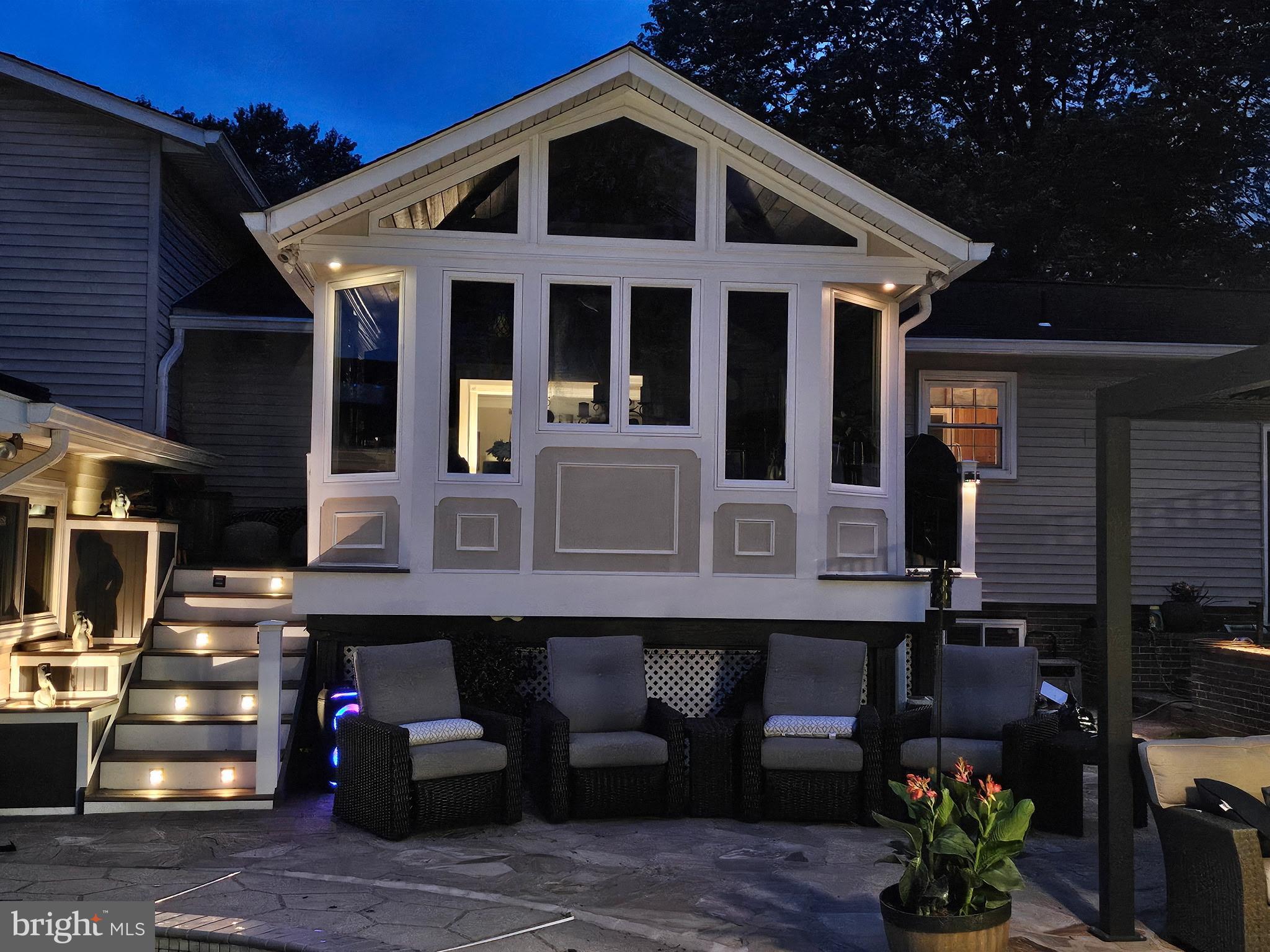 224 Prince Street Northeast Leesburg, VA 20176 - Photo 78 of 84 Charming evening glow of a modern sunroom.