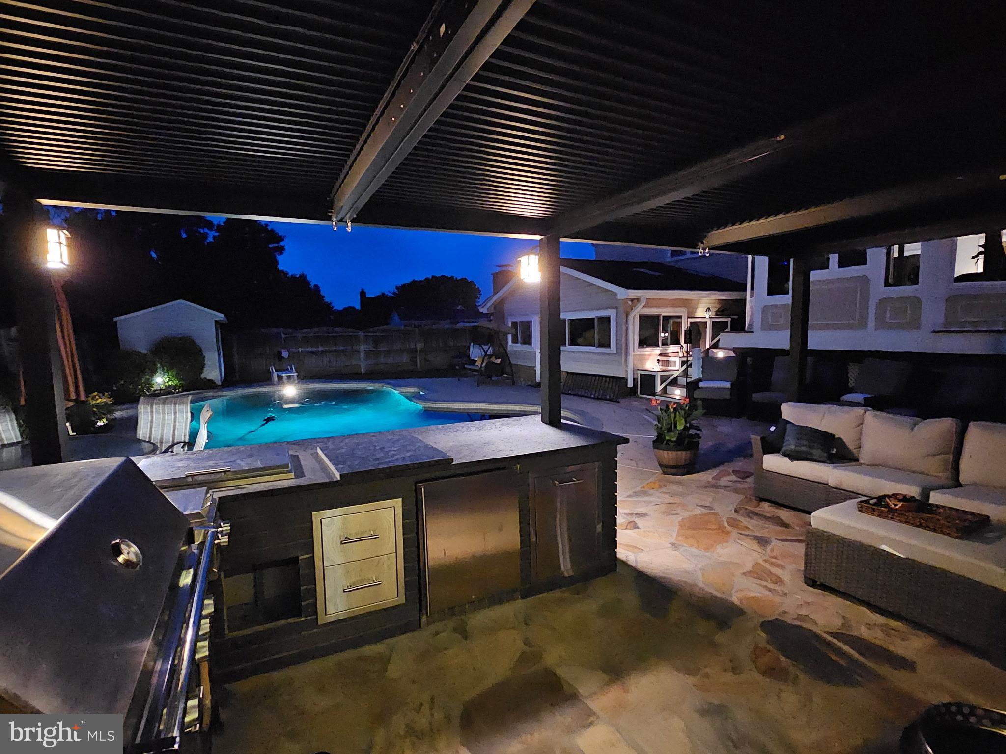 224 Prince Street Northeast Leesburg, VA 20176 - Photo 81 of 84 Elegant outdoor oasis with poolside charm.