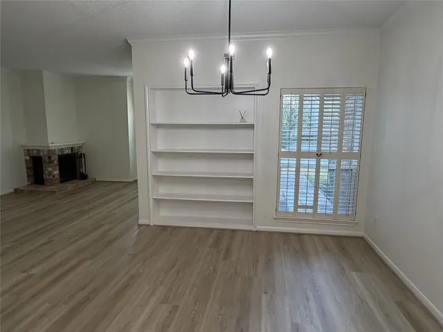 a view of a room that has a window