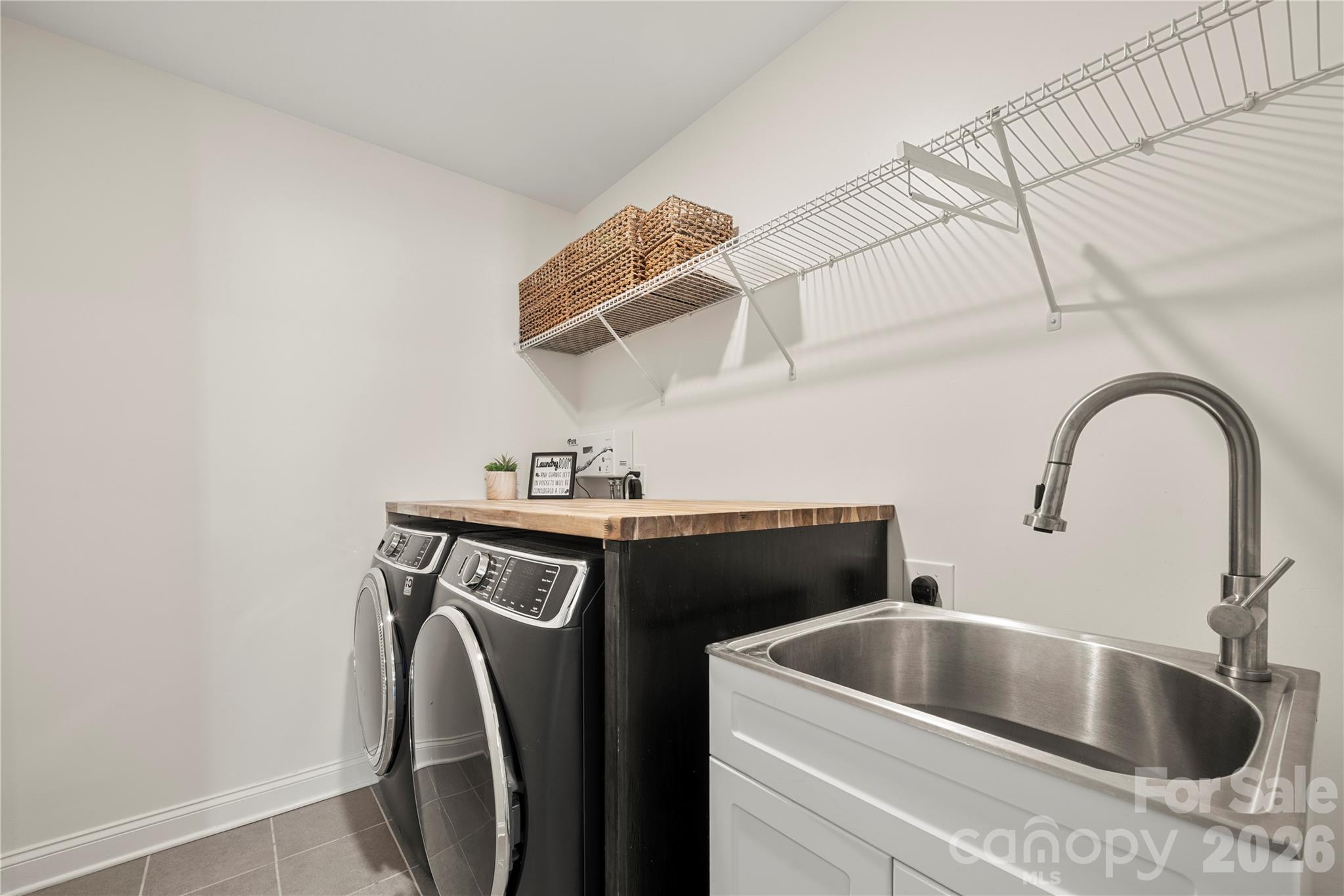 11266 Trailside Road Concord, NC 28027 - Photo 31 of 48 a kitchen with a sink and a stove top oven