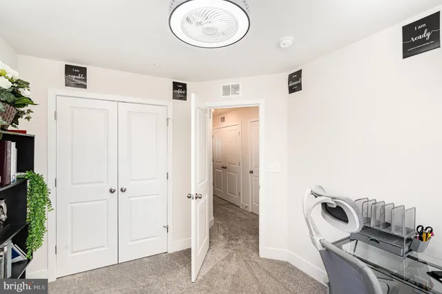 a view of a storage & utility room with a sink