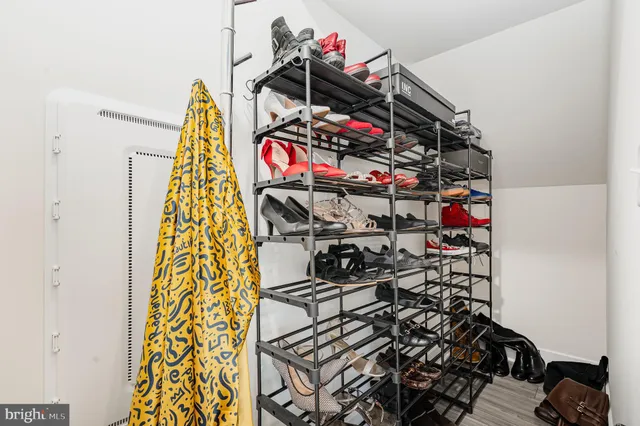 a view of a closet with storage