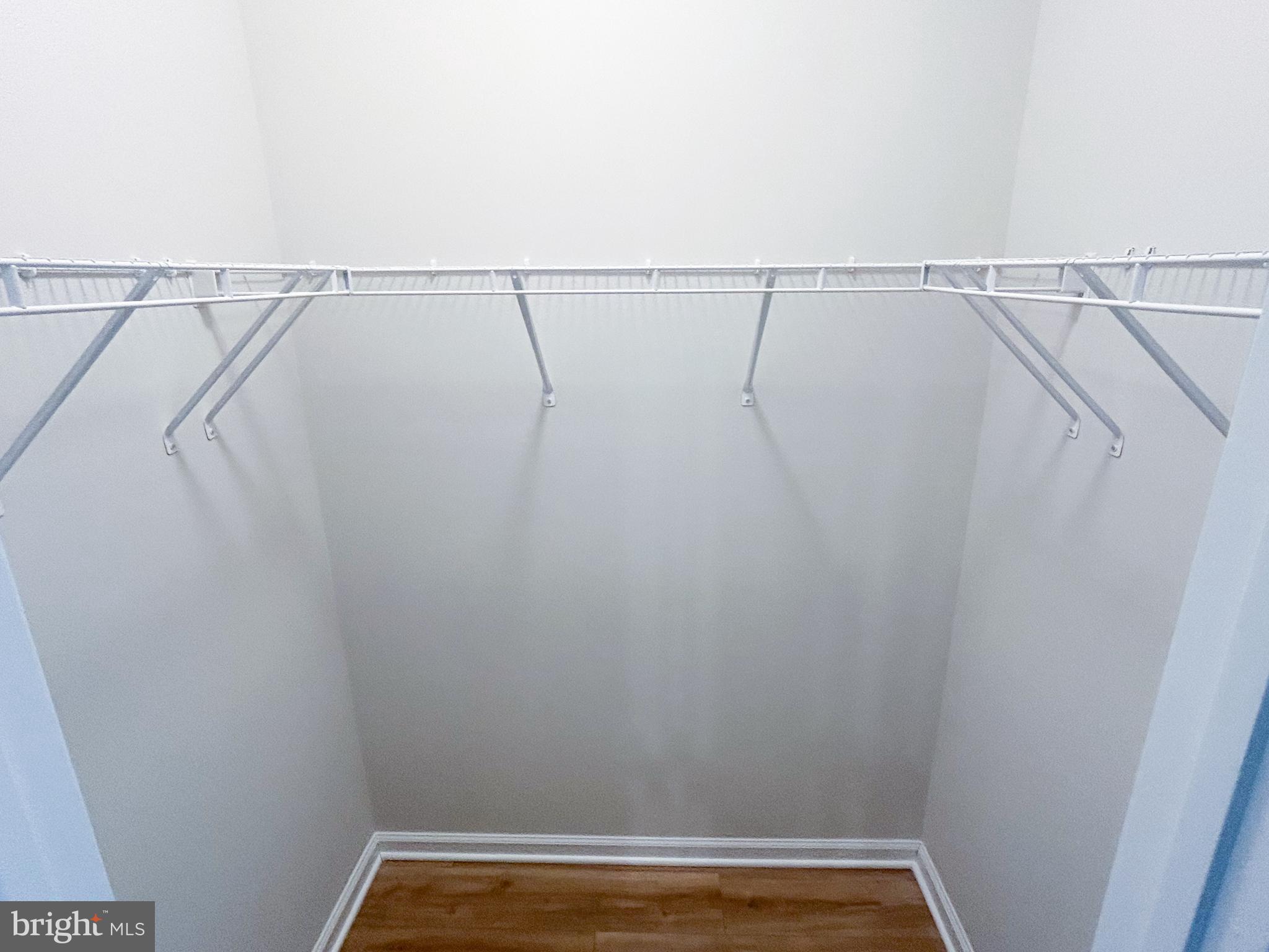 119 Heirloom Way Winchester, VA 22603 - Photo 13 of 26 a view of a room with racks on the wall