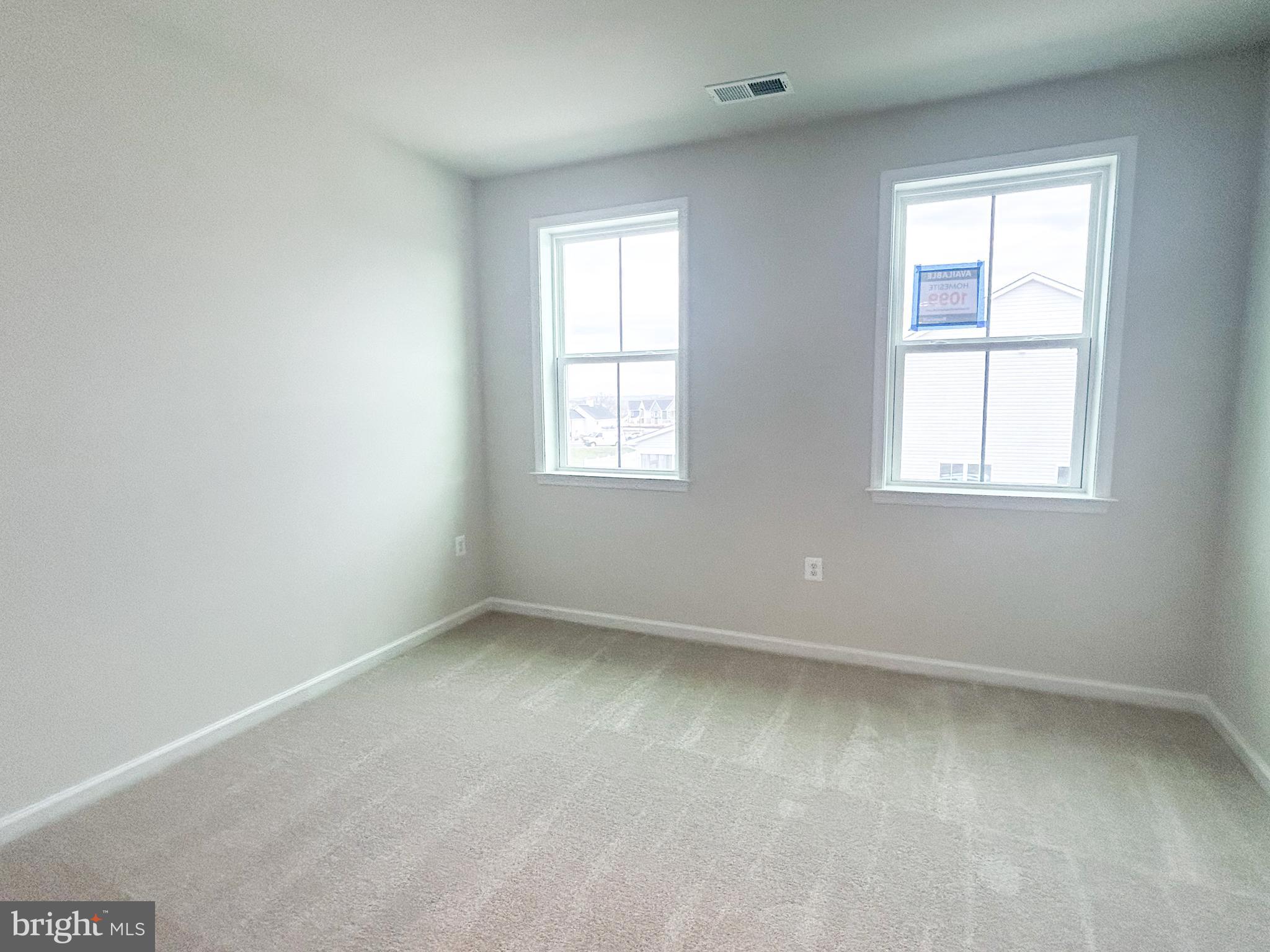 119 Heirloom Way Winchester, VA 22603 - Photo 17 of 26 an empty room with a window