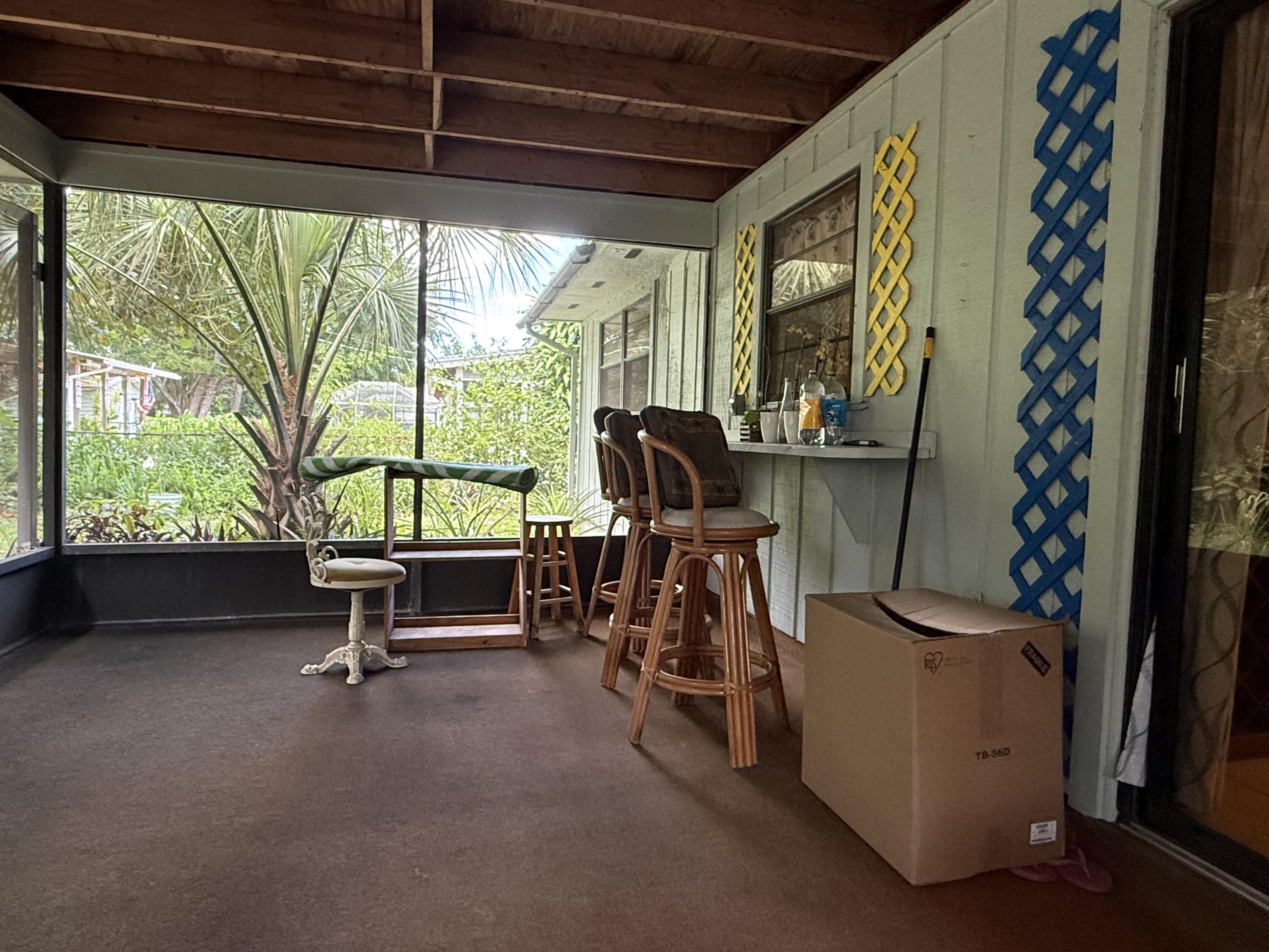 945 33rd Avenue Southwest Vero Beach, FL 32968 - Photo 22 of 22 a view of a room with gym equipment