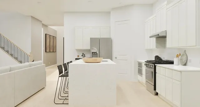 a view of storage and utility room with washer and dryer