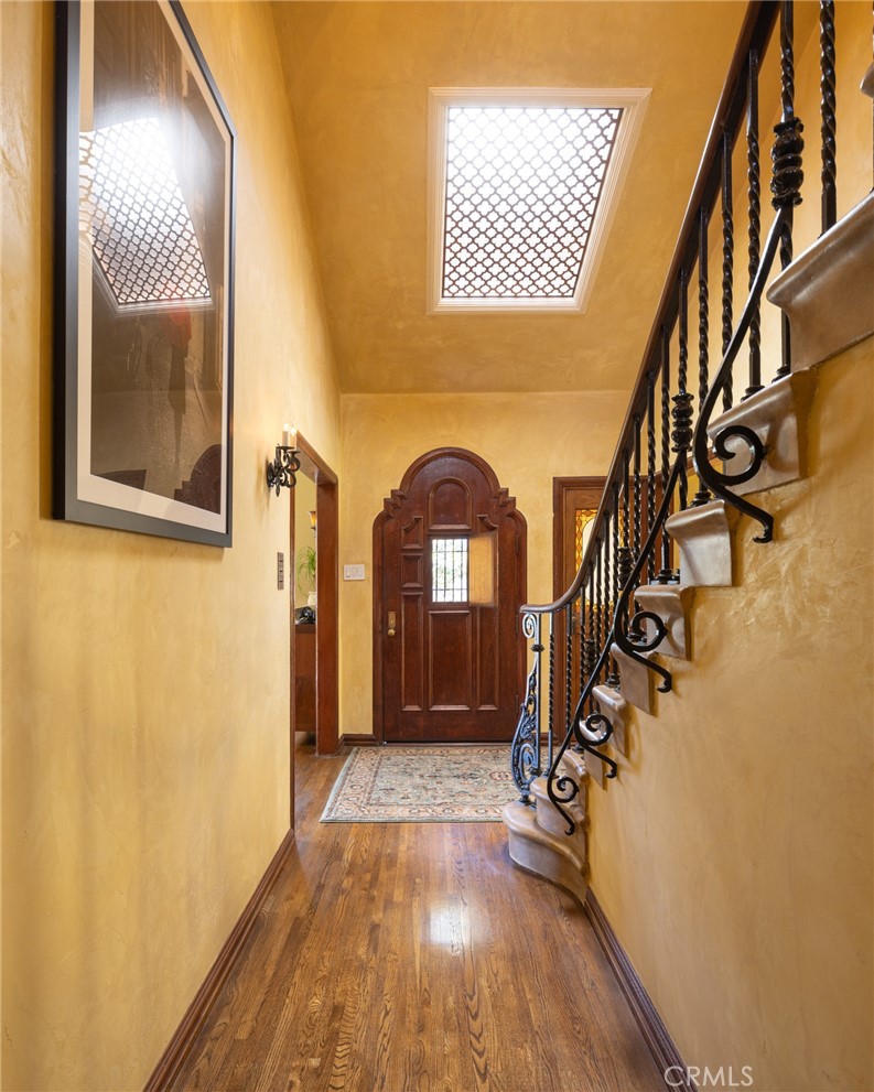 100 Temple Avenue Long Beach, CA 90803 - Photo 15 of 57 a view of a hallway with wooden floor and staircase