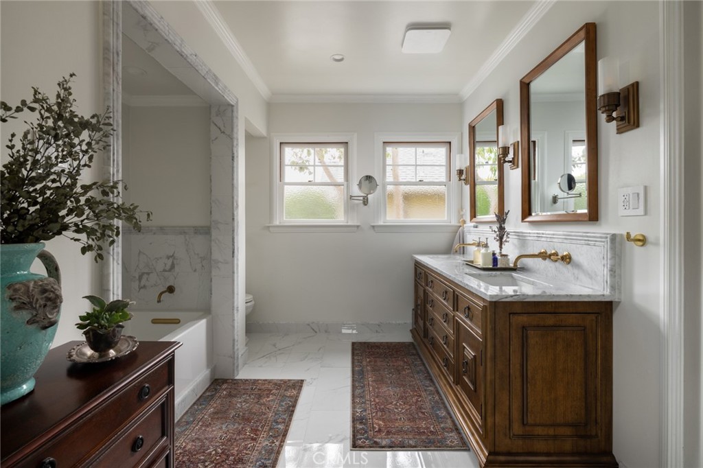 100 Temple Avenue Long Beach, CA 90803 - Photo 26 of 57 a spacious bathroom with a granite countertop sink a mirror and a shower