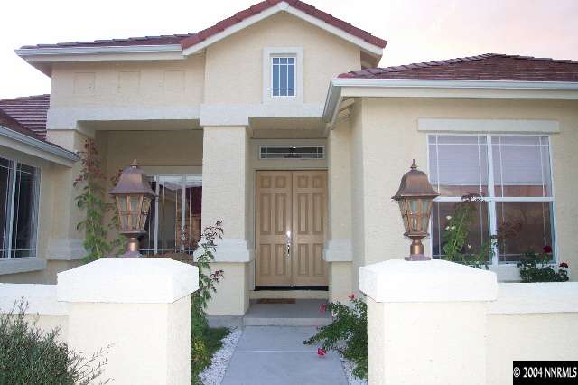 5614 North White Sands Road Reno, NV 89511 - Photo 2 of 9 a view of a house with a tub and shower