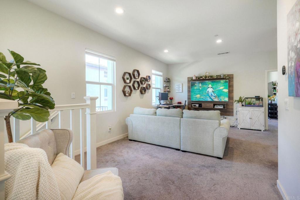 4141 Mission Tree Way Oceanside, CA 92057 - Photo 16 of 29 Currently set up with a desk, couch and TV