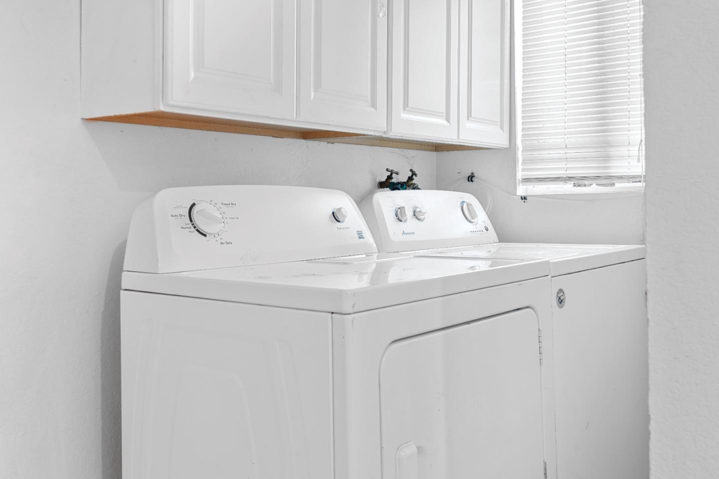 2009 69th Avenue Oakland, CA 94621 - Photo 14 of 16 a utility room with dryer and washer