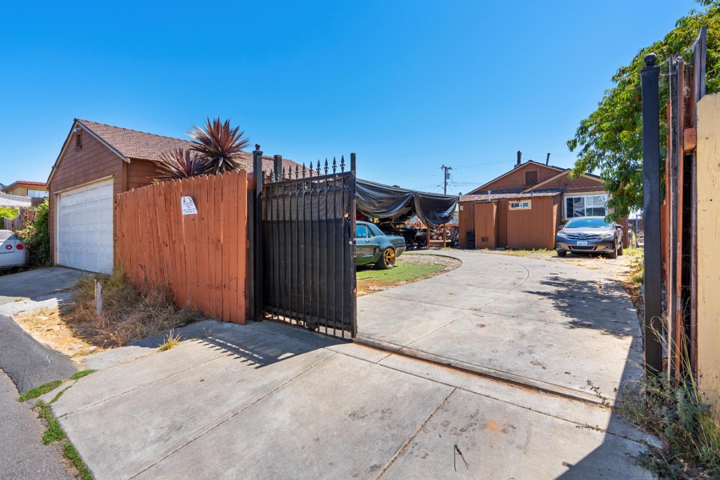 2009 69th Avenue Oakland, CA 94621 - Photo 15 of 16 a view of a house with a yard