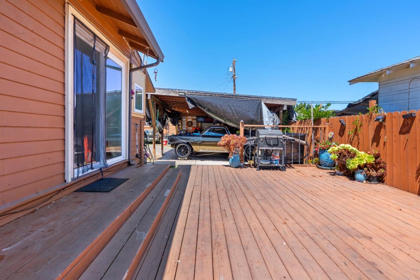 2009 69th Avenue Oakland, CA 94621 - Photo 16 of 16 a view of a terrace with wooden floor and furniture