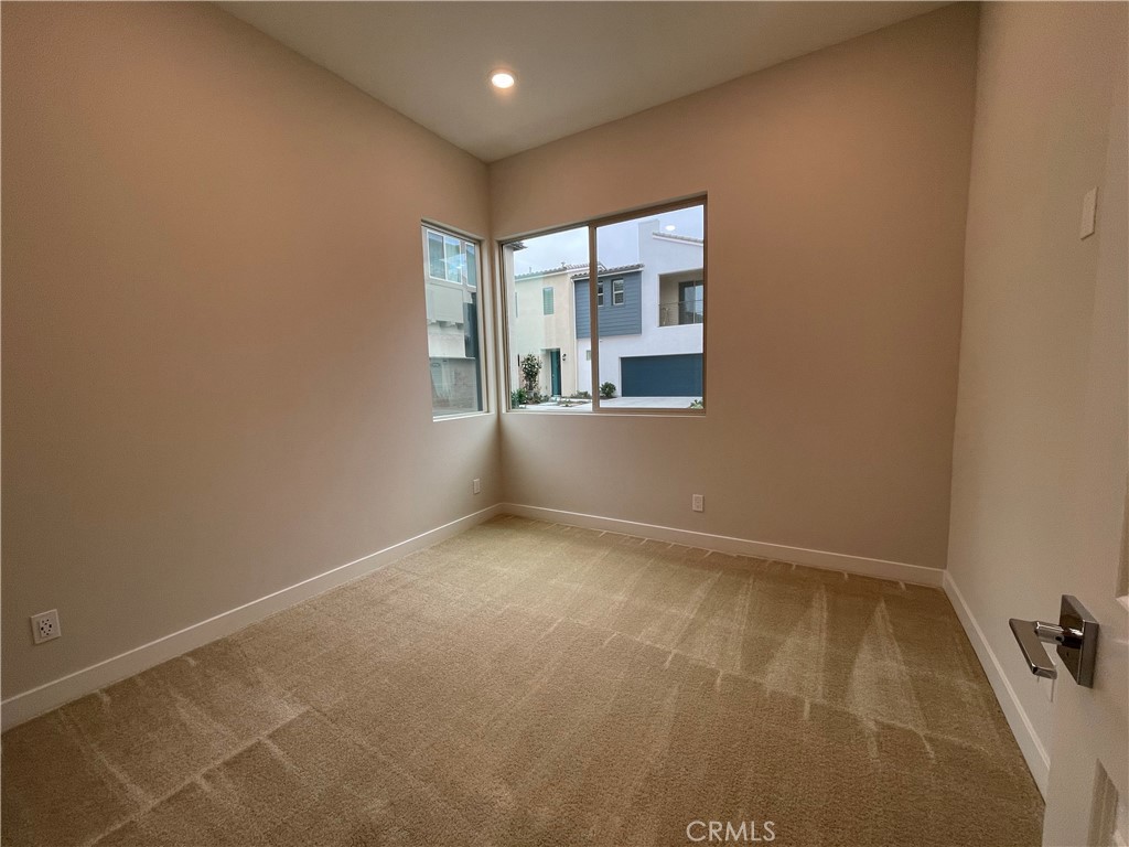145 Denali Lake Forest, CA 92630 - Photo 15 of 17 an empty room with windows