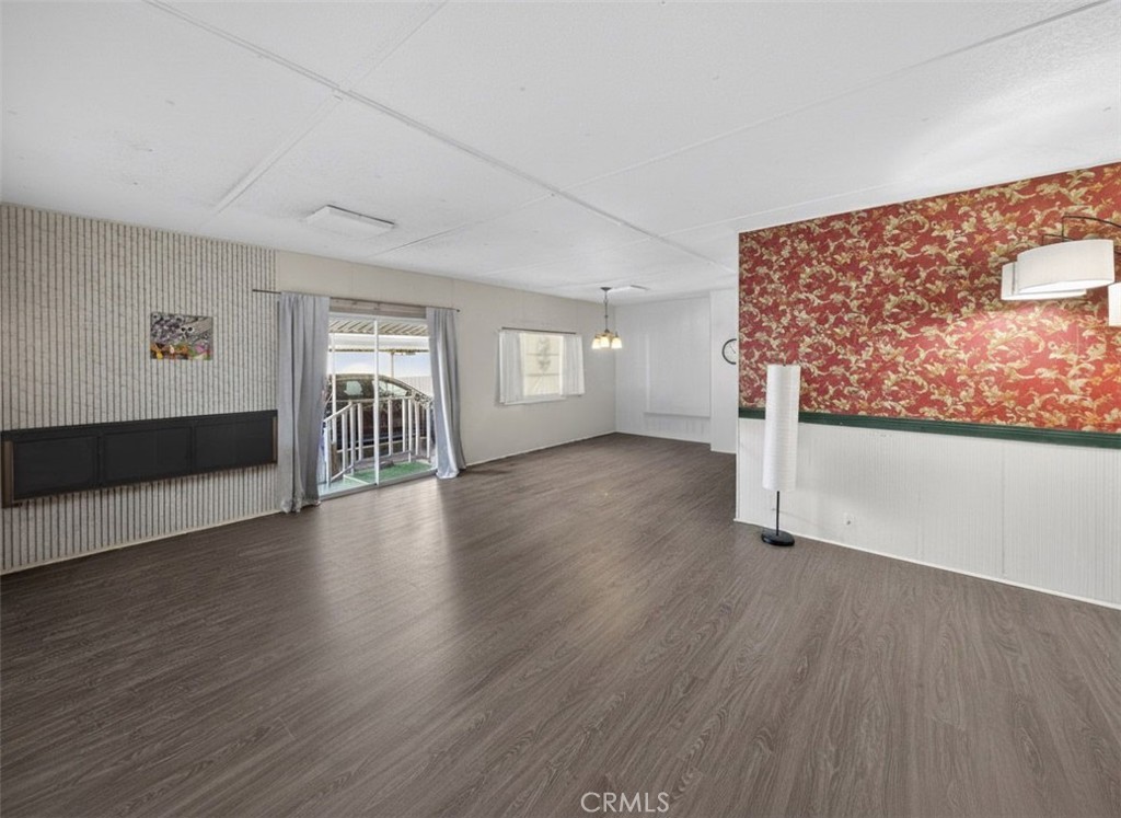 12656 2nd Street, Unit 55 Yucaipa, CA 92399 - Photo 11 of 29 a view of a livingroom with wooden floor