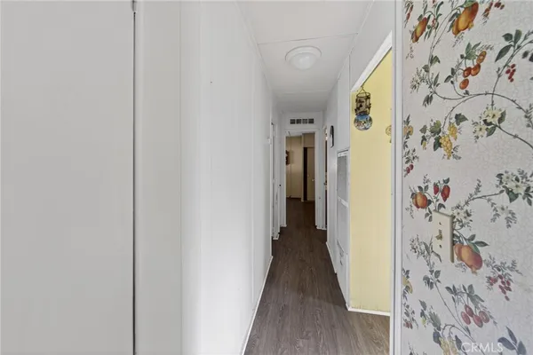 a view of a bathroom with a sink and a mirror