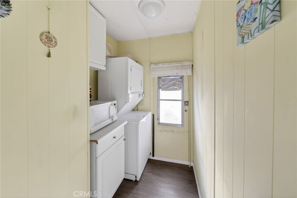 12656 2nd Street, Unit 55 Yucaipa, CA 92399 - Photo 15 of 29 a kitchen with a refrigerator and a sink