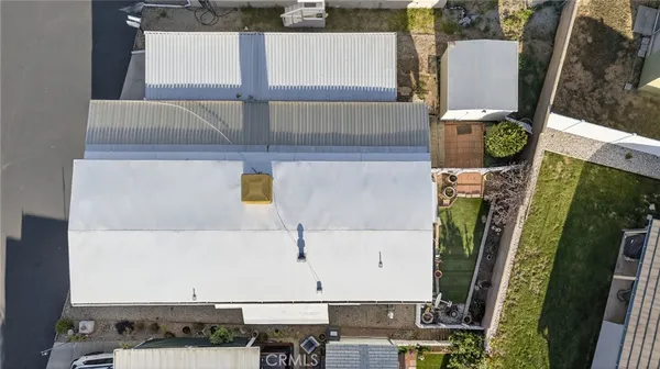 a view of a city with mountains in the background