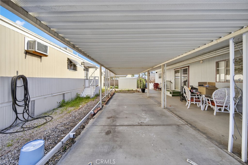 12656 2nd Street, Unit 55 Yucaipa, CA 92399 - Photo 6 of 29 a view of a porch with patio