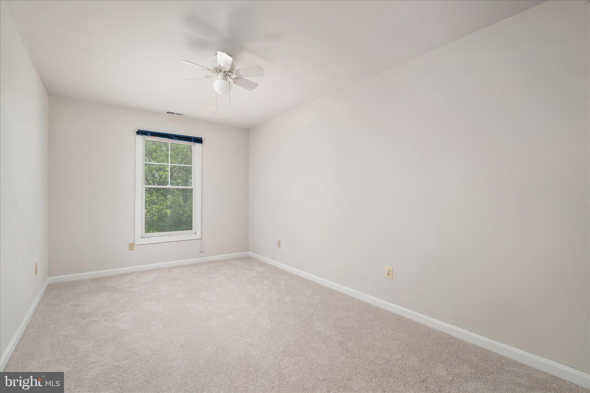 3961 Rectortown Road Marshall, VA 20115 - Photo 17 of 35 an empty room with a window