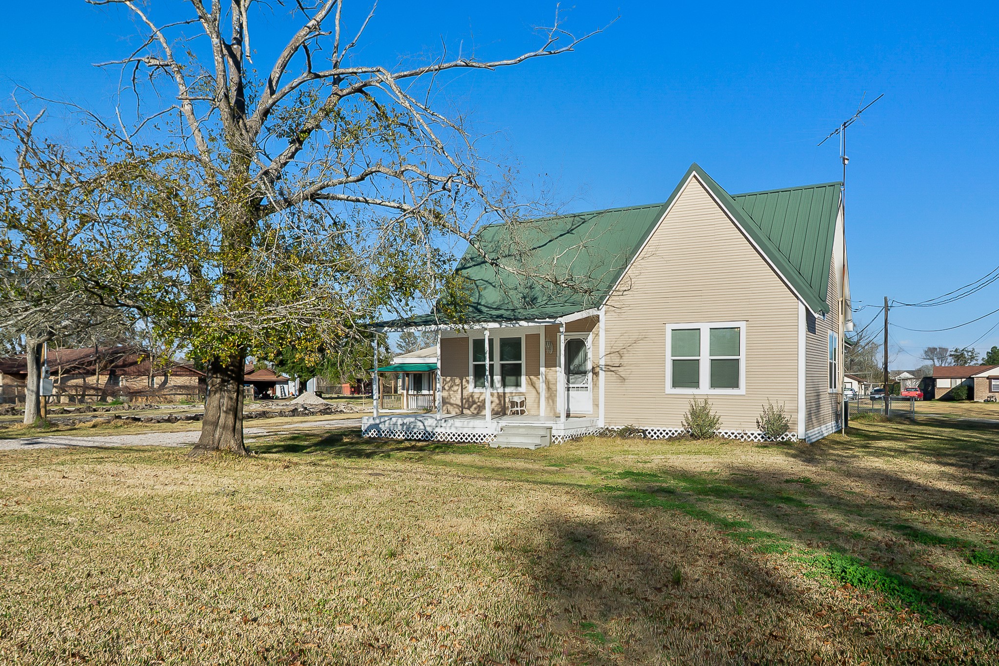 109 Maple Street Highlands, TX 77562 - Photo 7 of 50 a front view of a house with garden