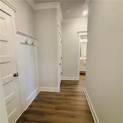 a view of a porch with furniture and garden