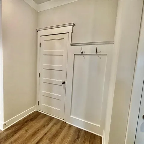 a view of a patio with a table and chairs