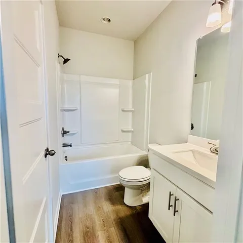 a view of a park with large trees