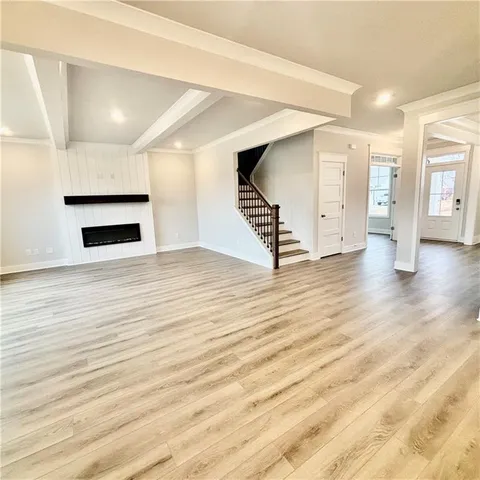 a spacious bathroom with a double vanity sink and a mirror