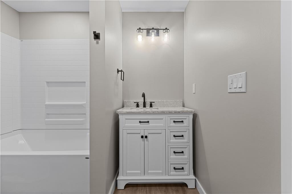 300 Gilkeson Road, Unit 10B Pittsburgh, PA 15228 - Photo 11 of 25 a view of bathroom with a sink and a mirror