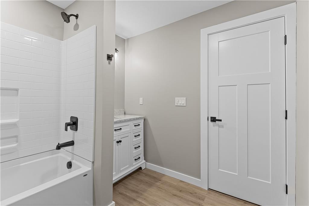 300 Gilkeson Road, Unit 10B Pittsburgh, PA 15228 - Photo 12 of 25 a bathroom with a bathtub and a shower