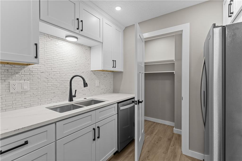 300 Gilkeson Road, Unit 10B Pittsburgh, PA 15228 - Photo 4 of 25 a kitchen with a sink and cabinets