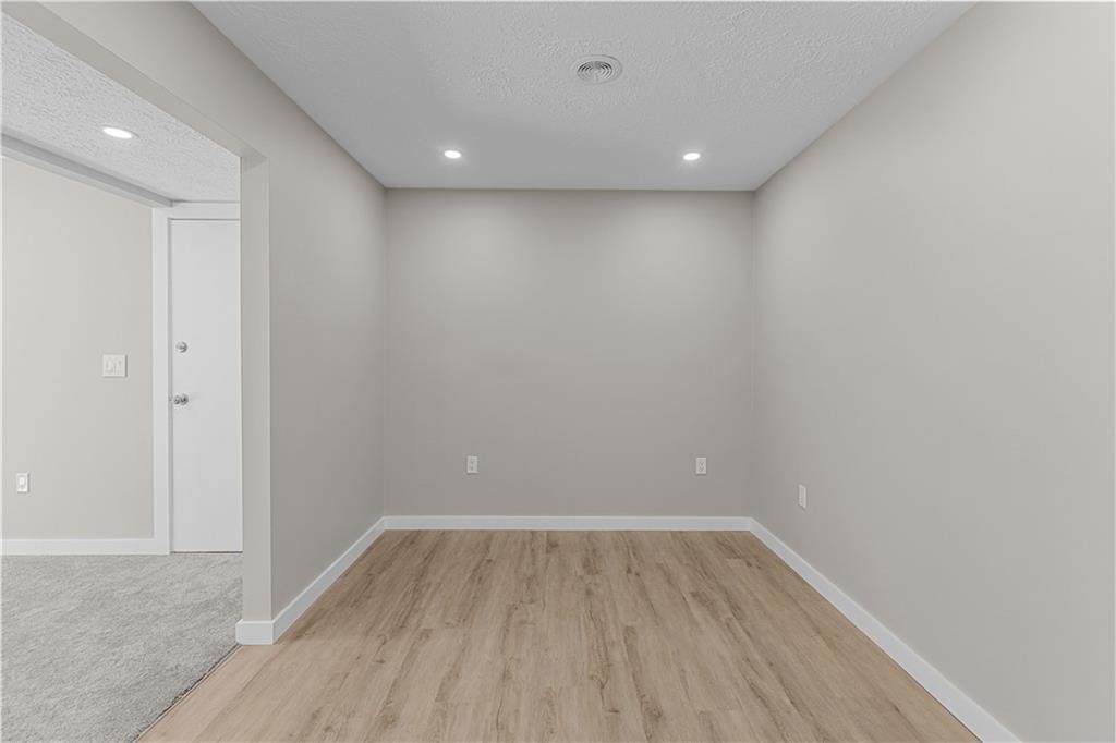 300 Gilkeson Road, Unit 10B Pittsburgh, PA 15228 - Photo 9 of 25 a view of empty room with wooden floor