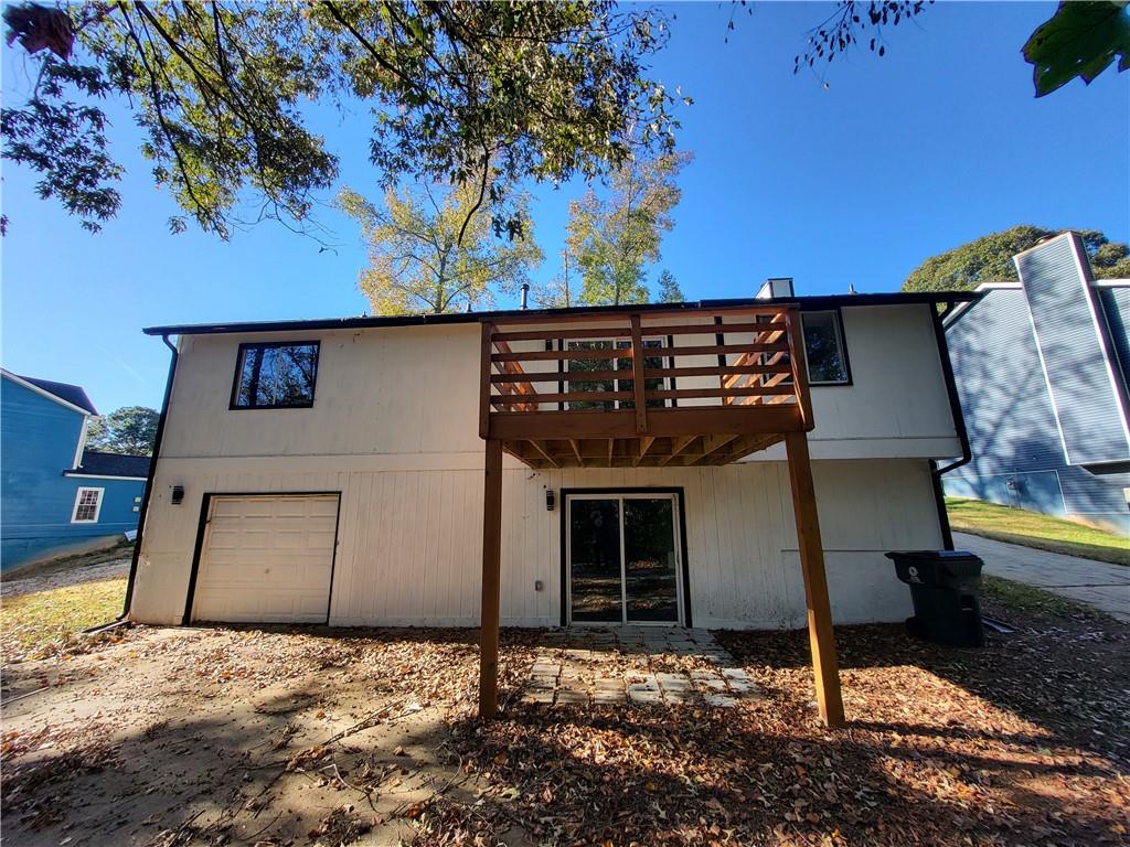 5729 Rock Road Union City, GA 30291 - Photo 16 of 17 a backyard of a house with lots of green space