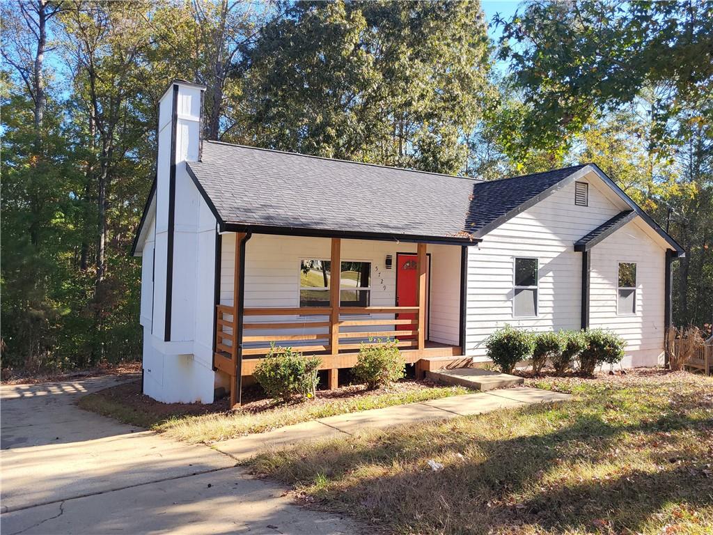 5729 Rock Road Union City, GA 30291 - Photo 2 of 17 a view of a house with backyard and sitting area
