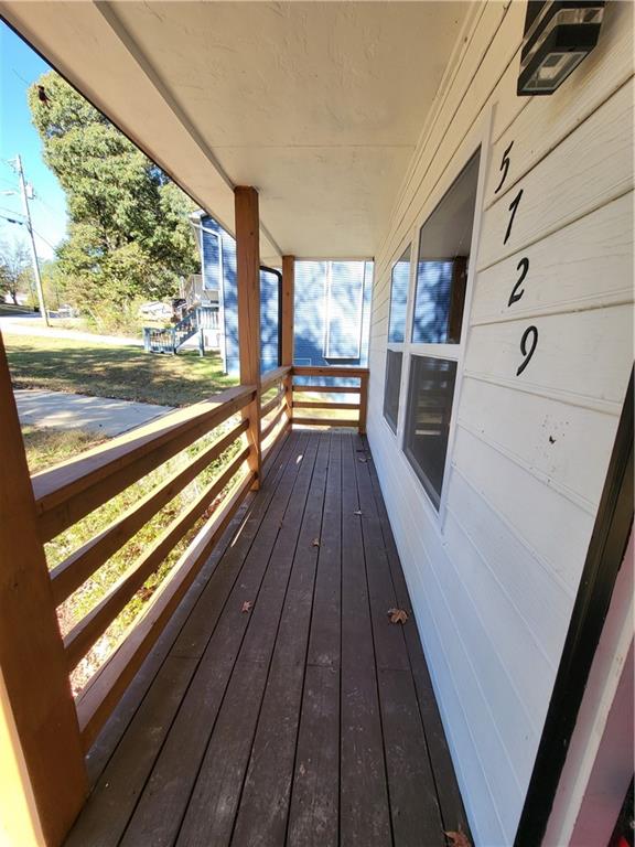 5729 Rock Road Union City, GA 30291 - Photo 3 of 17 a view of balcony with wooden floor