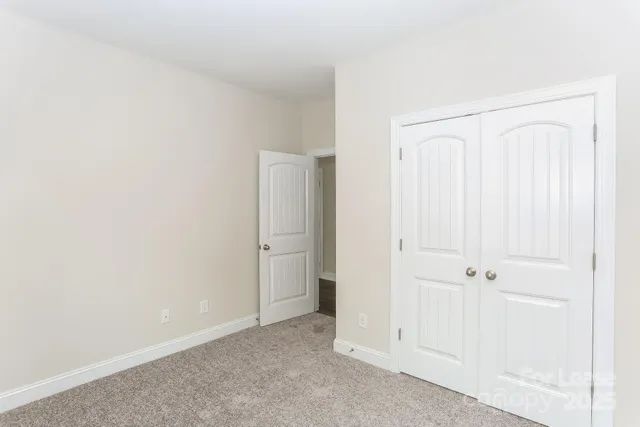 an empty room with closet