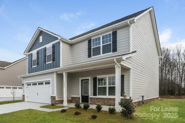 a front view of house with yard