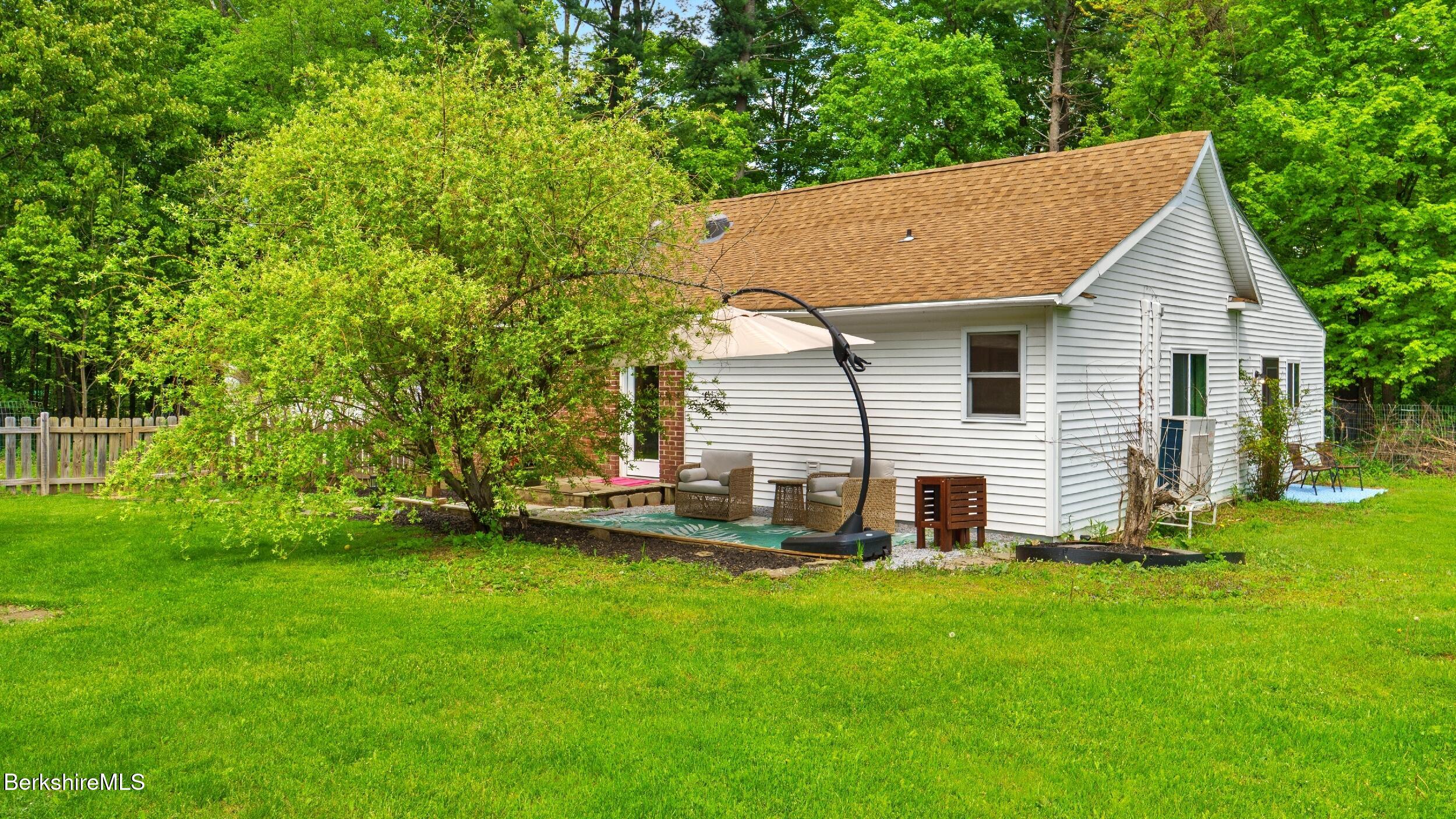 20 East Dugway Road Lenox, MA 01240 - Photo 66 of 84 a view of a house with backyard and garden